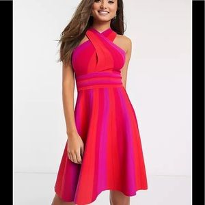 Kilyiee knitted crossover dress in bright pink.